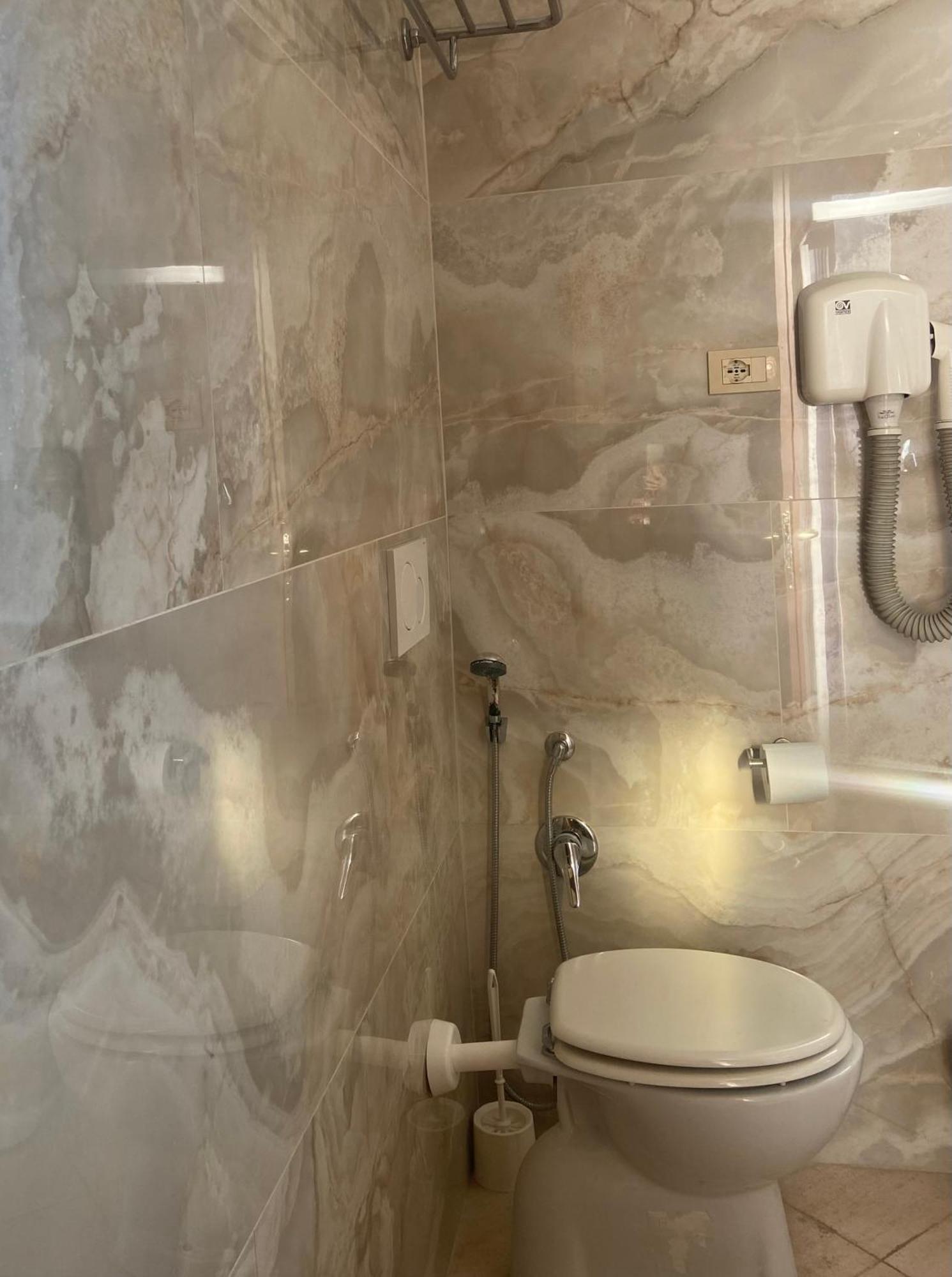 Quarto Quádruplo com Varanda