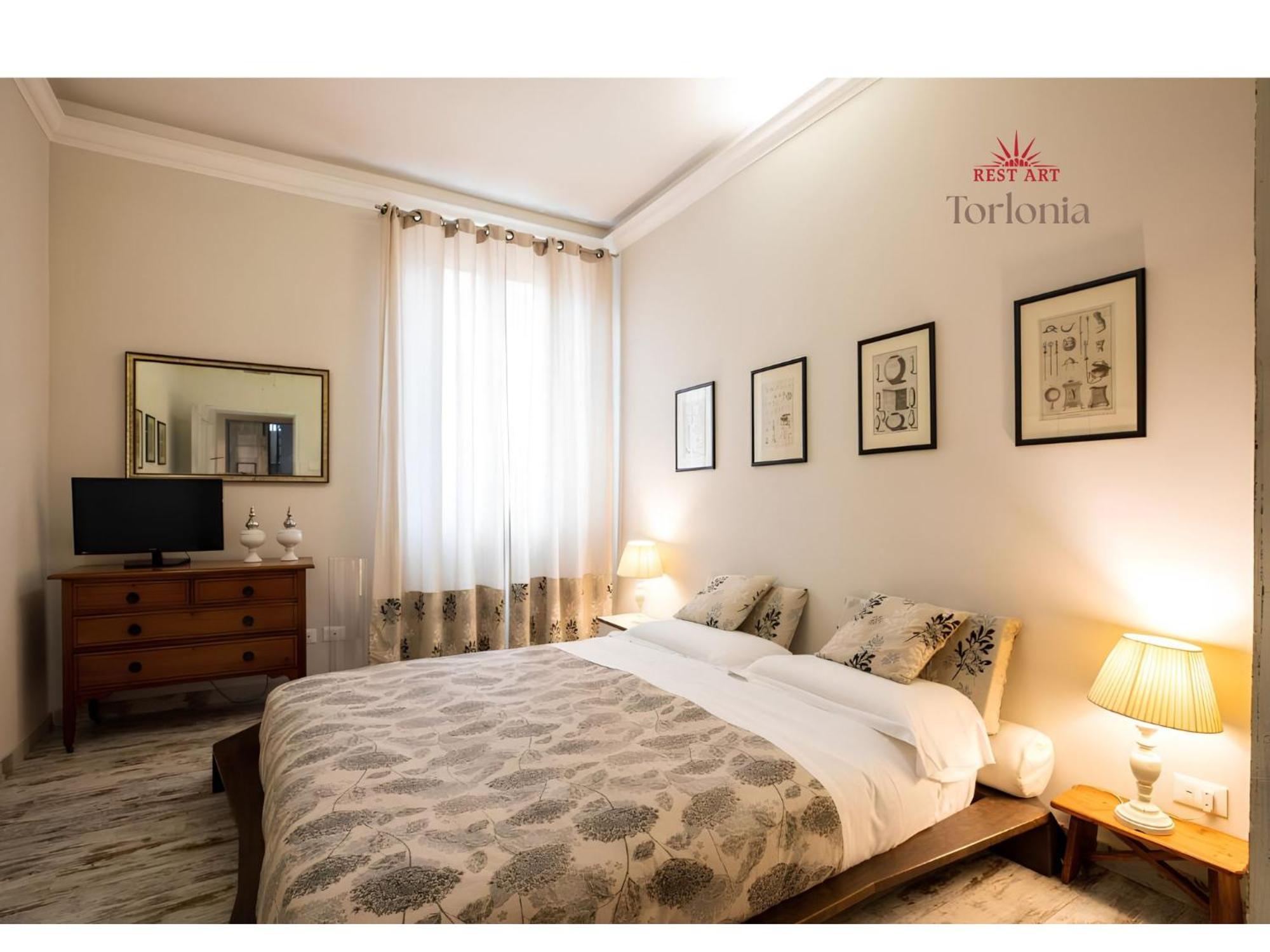 Colosseo Two-Bedroom Apartment Via di San Giovanni Laterano 60