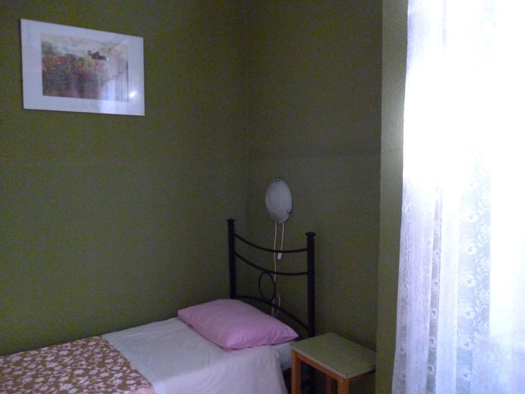 Quarto Individual com Banheiro Compartilhado