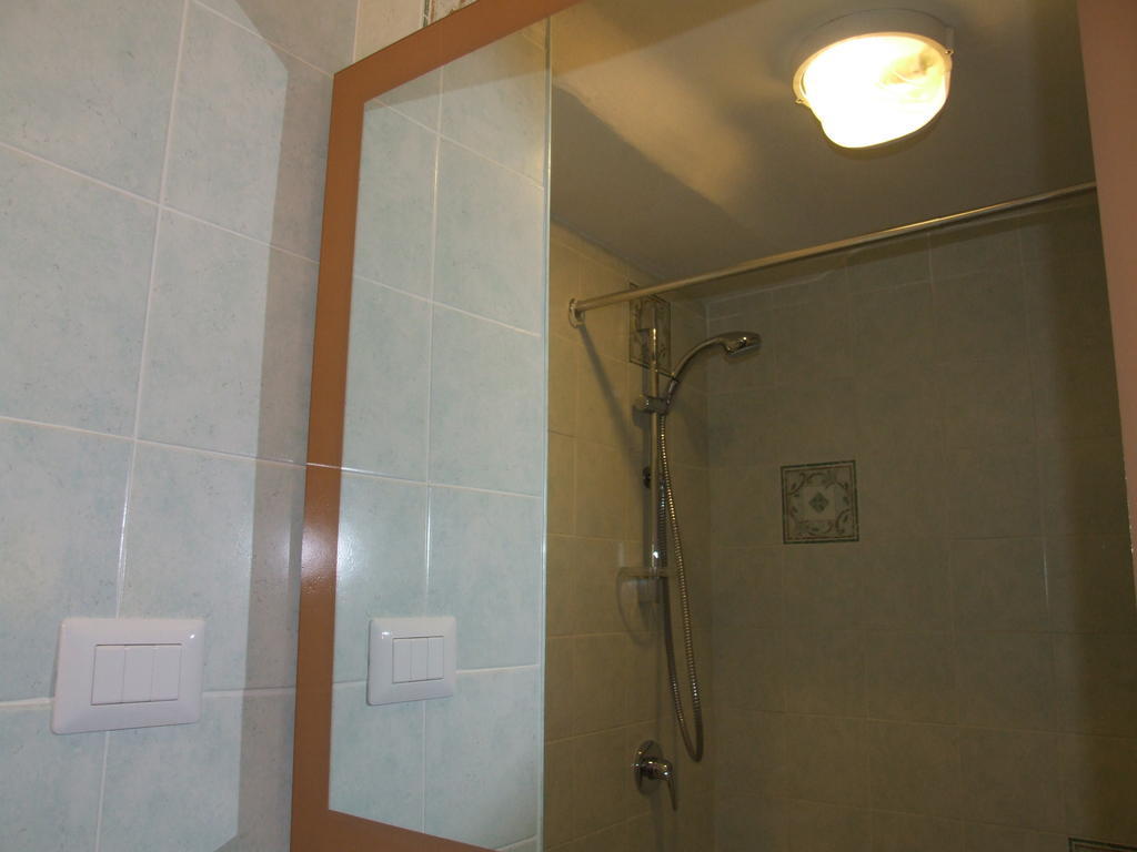Quarto Quádruplo com Banheiro Compartilhado